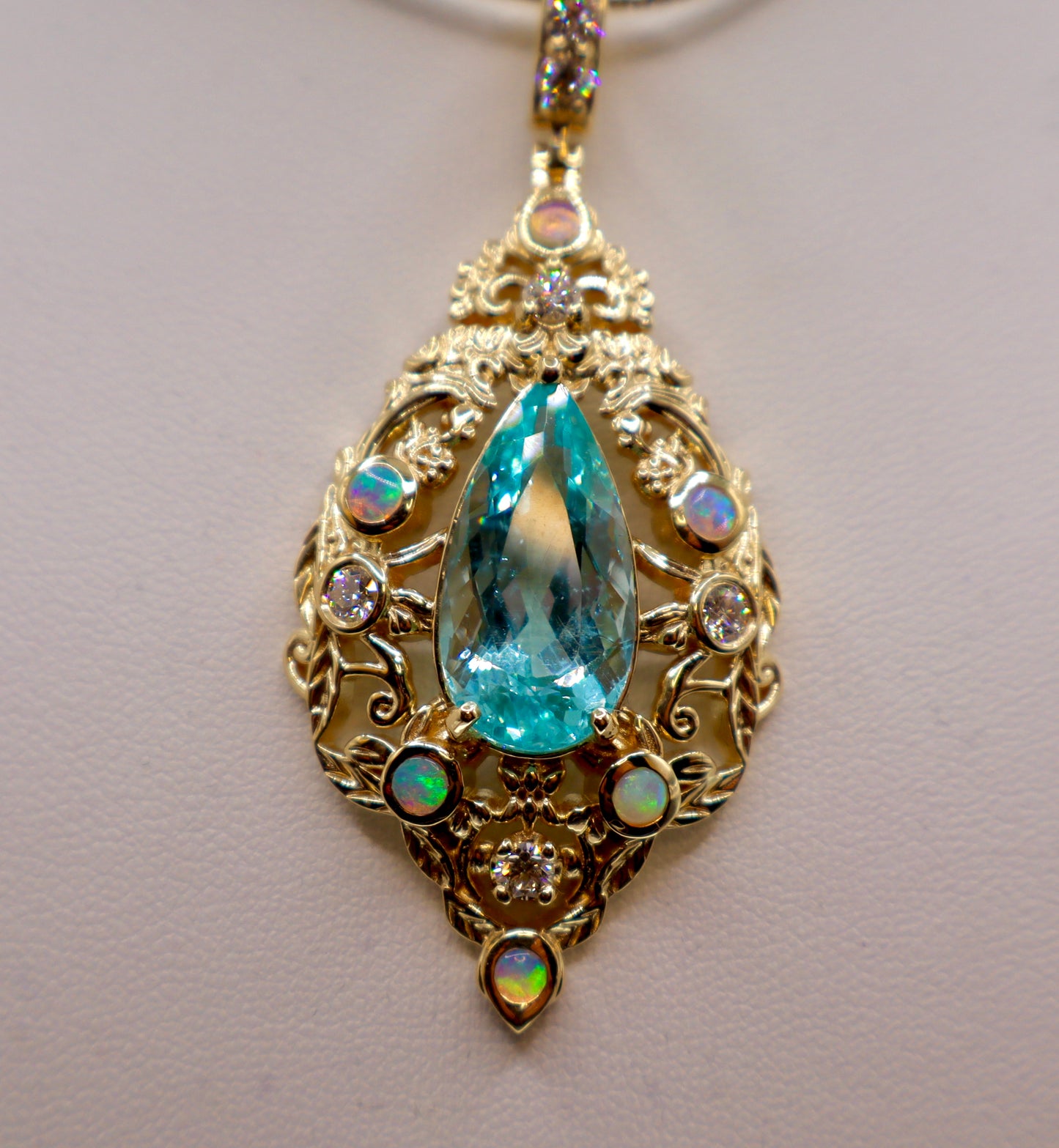 Radiant 10.5 Carat Paraiba Blue Apatite Pendant with Opals & Diamonds