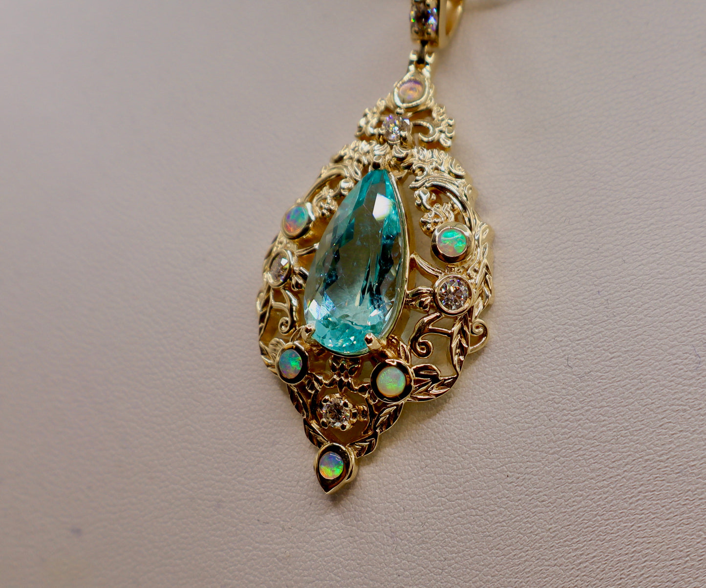 Radiant 10.5 Carat Paraiba Blue Apatite Pendant with Opals & Diamonds