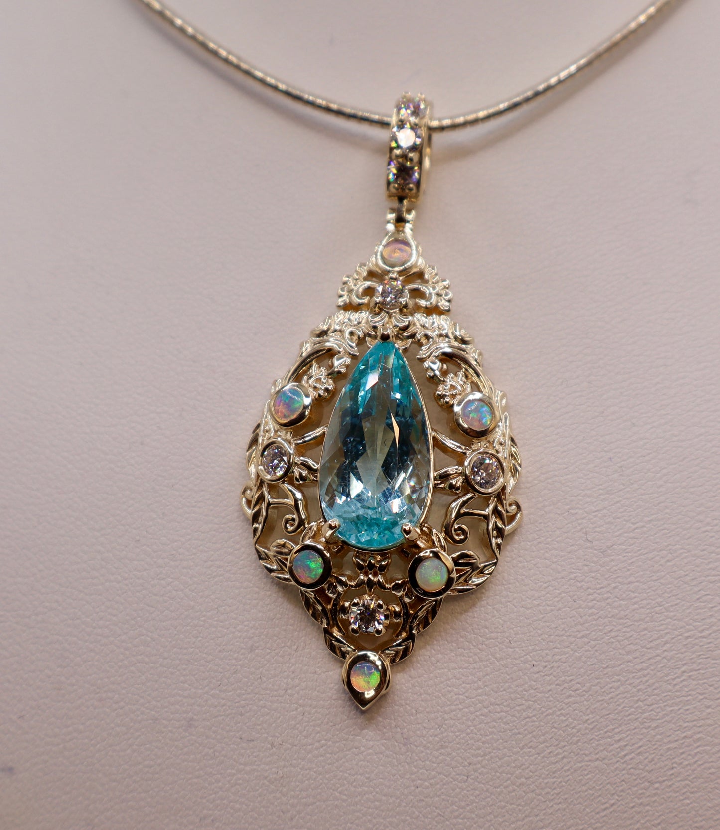 Radiant 10.5 Carat Paraiba Blue Apatite Pendant with Opals & Diamonds