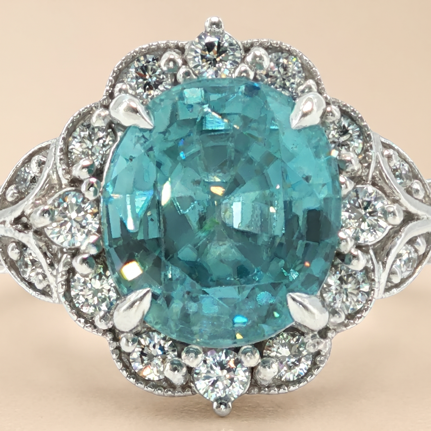 Belle Époque Inspired Blue Zircon & Diamond Halo Ring in Platinum