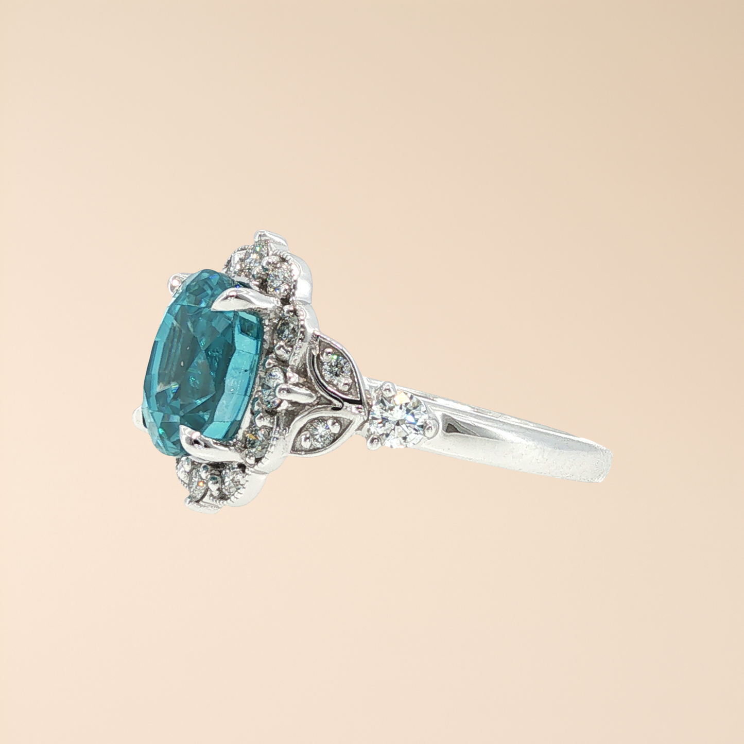 Belle Époque Inspired Blue Zircon & Diamond Halo Ring in Platinum