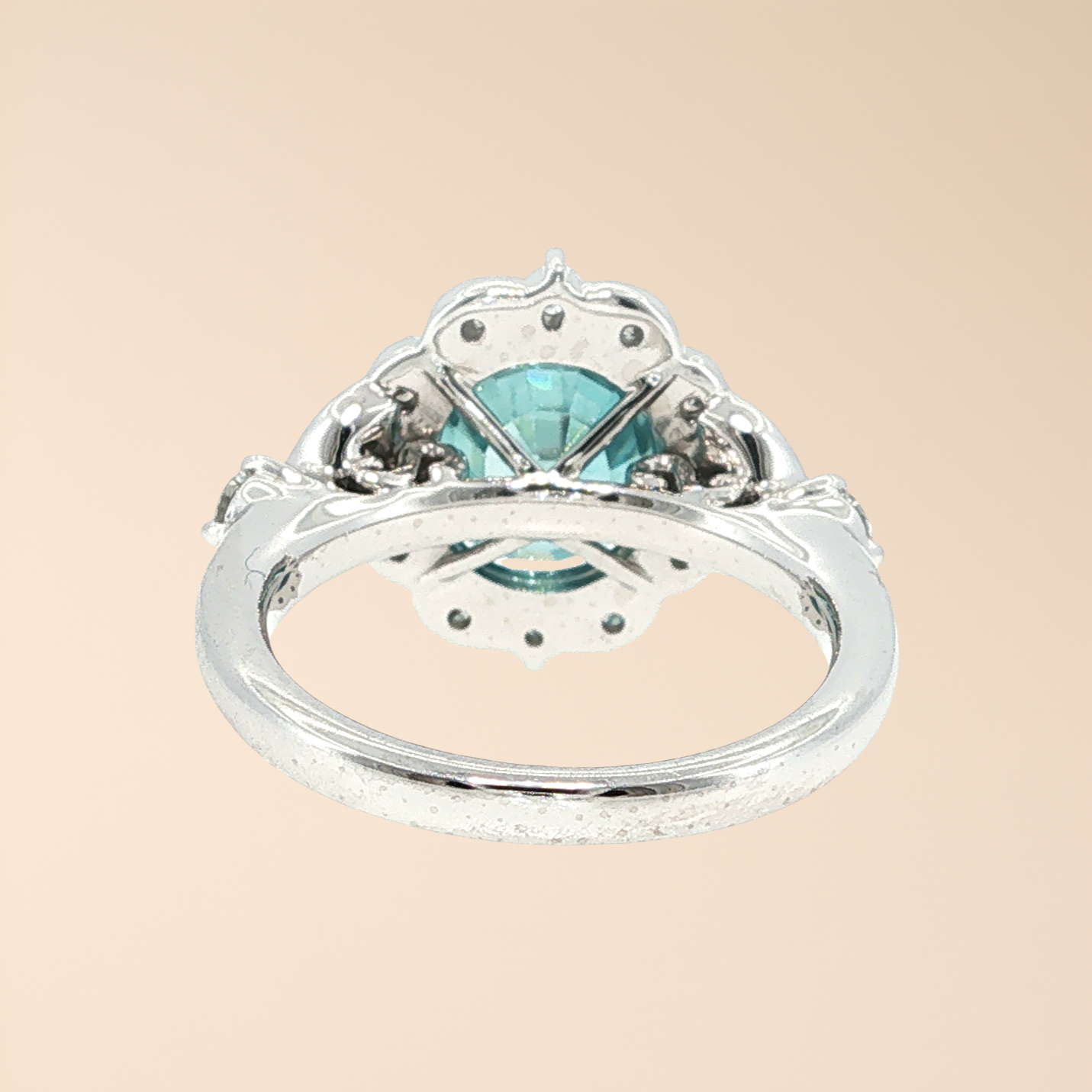 Belle Époque Inspired Blue Zircon & Diamond Halo Ring in Platinum