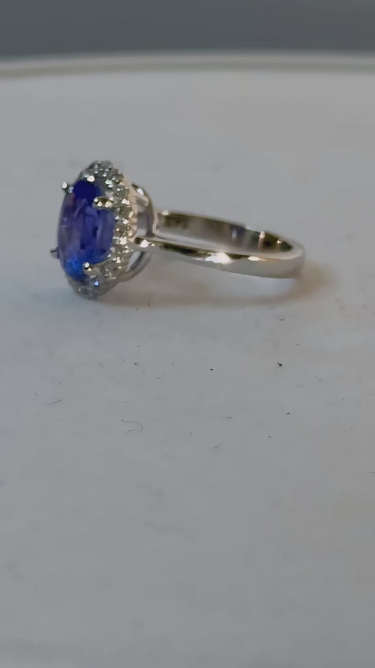 Violet Tanzanite & Diamond Halo Ring